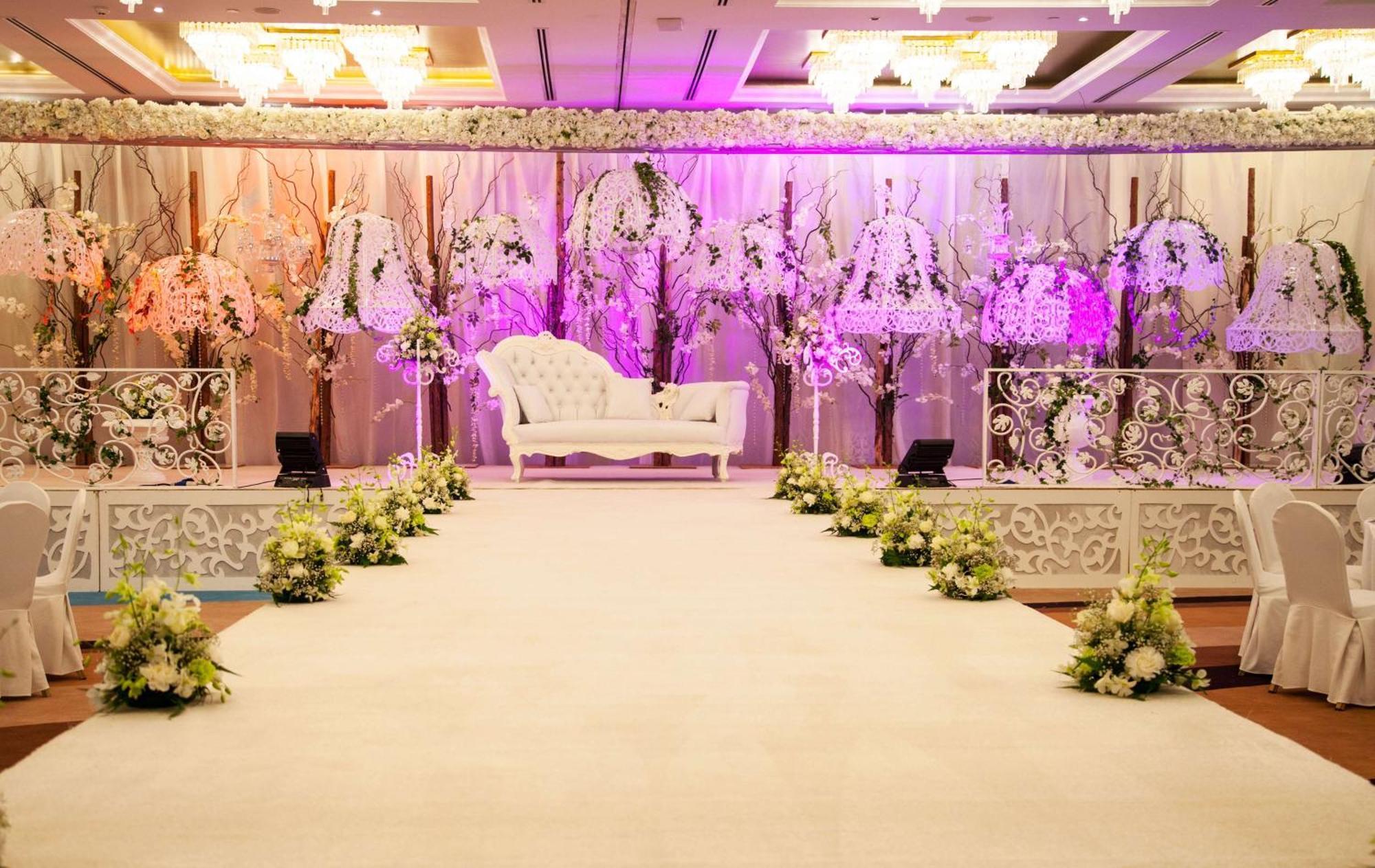 Radisson Blu Hotel, Dubai Deira Creek Exterior photo A modern Indian wedding reception
